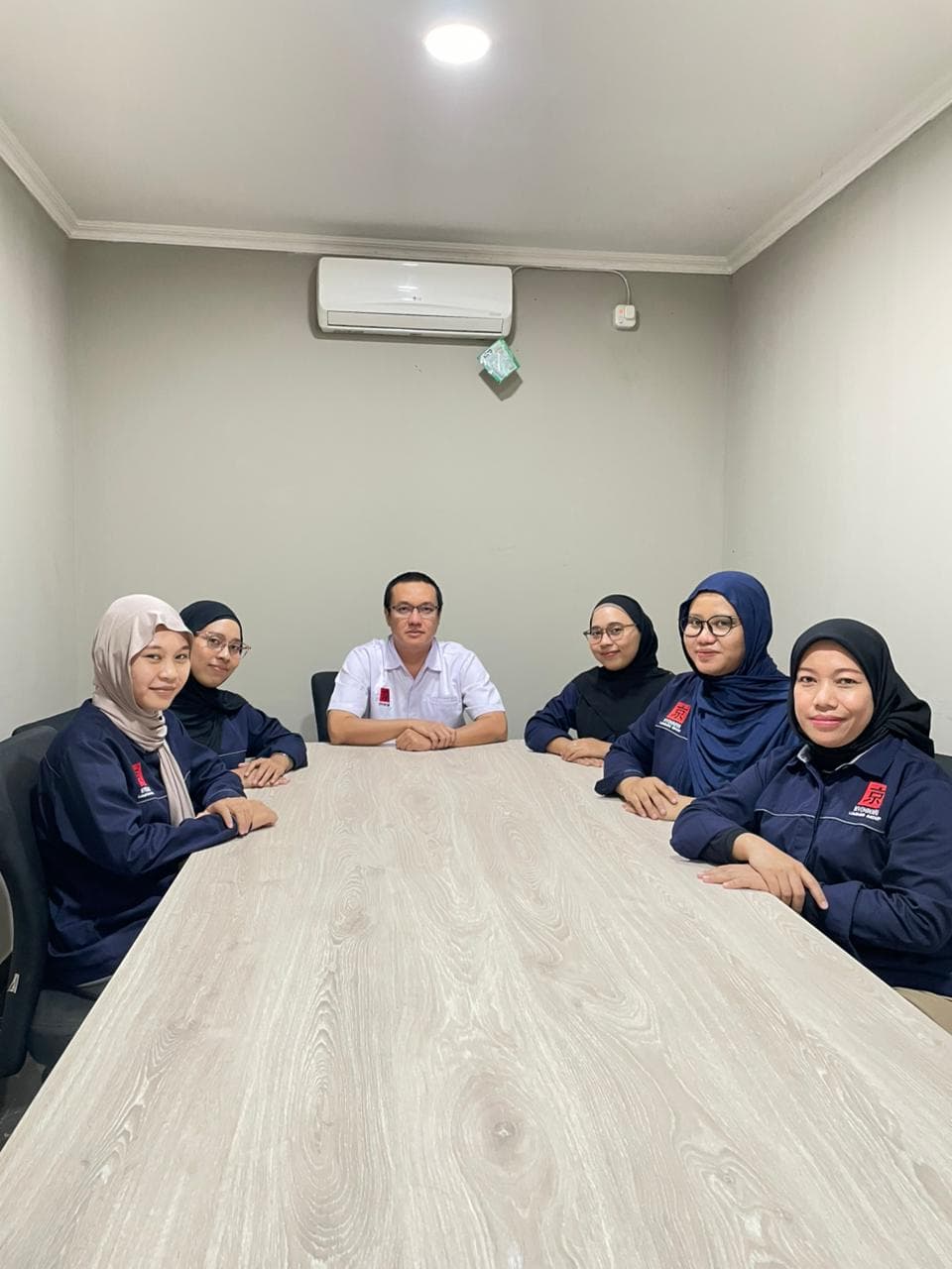 Photo with management team